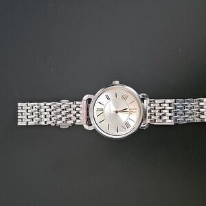 Vintage Anne Klein Silver Watch With Gold Roman Numerals